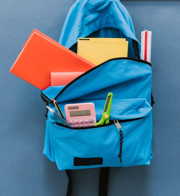 blue backpack with books